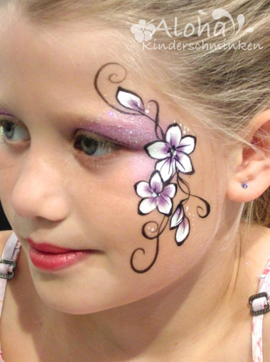 Colourful carnival face paint design for children