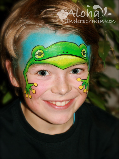 Frog face painting in green tones