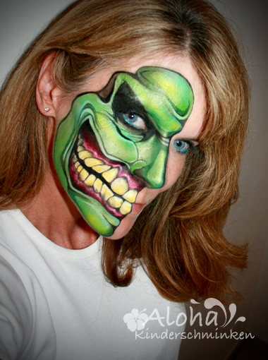 Half-face painting design for Halloween with special effects