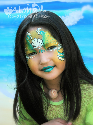 Mermaid face painting with imaginative details