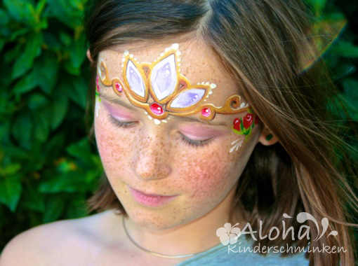 Princess face painting makeup with elegant details