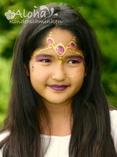 Princess face painting with delicate patterns