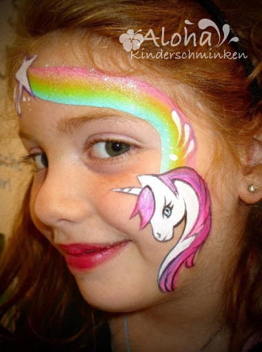 Rainbow face painting with bright colours