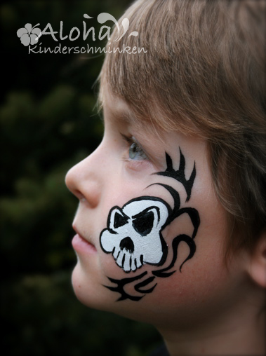 Skeleton face painting for Halloween with fine line work