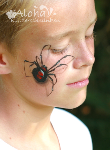 Spider makeup art for Halloween with fine, detailed lines