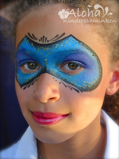 Venetian mask face painting inspired by costume and cosplay styles