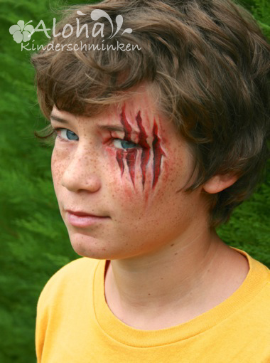 Wound and claw effect face makeup for Halloween